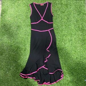 Black sleeveless swing dress with pink satin trim.